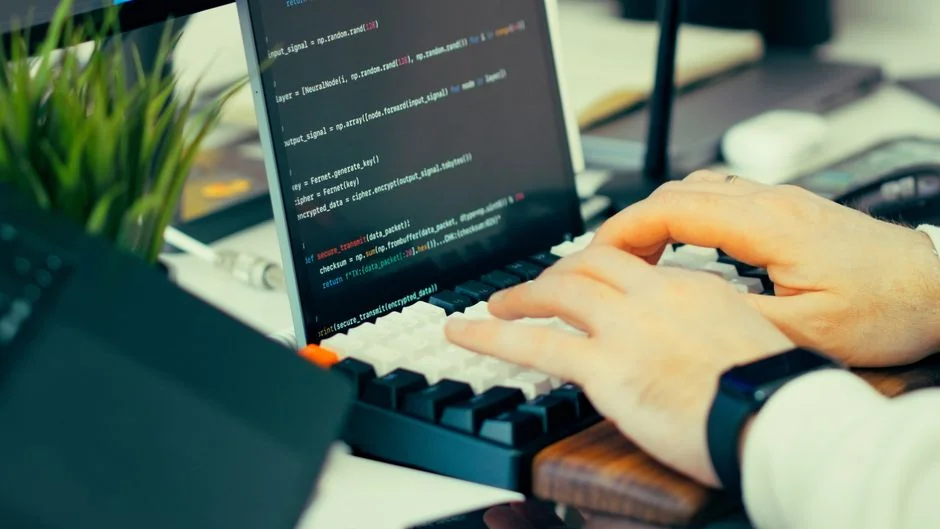 Laptop screen showing Pexels website, ideal for stock photo needs.